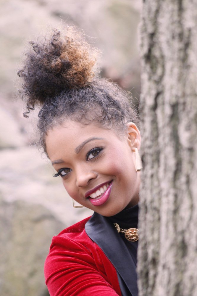 A woman smiling, sure of herself
